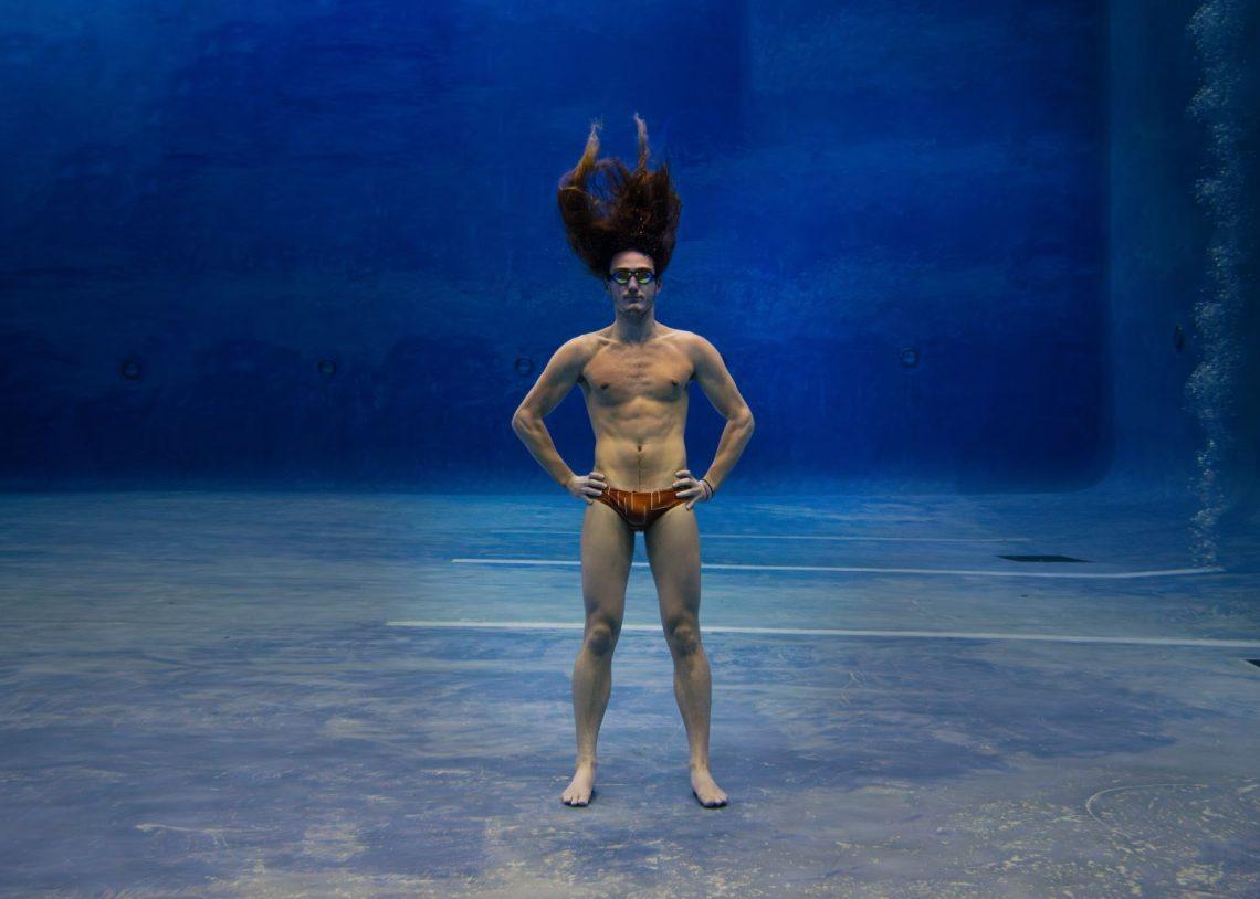 Ivan standing on the bottom of a swimming pool