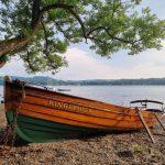 A rowing boat on the shore of Loch Lomond