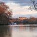 The River Thames at sunset near Richmond with the Star and Garter home on Richmond Hill in the background, illuminated by the setting sun.