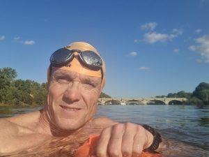 A selfie of the author in the Thames with Richmond Loch in the background